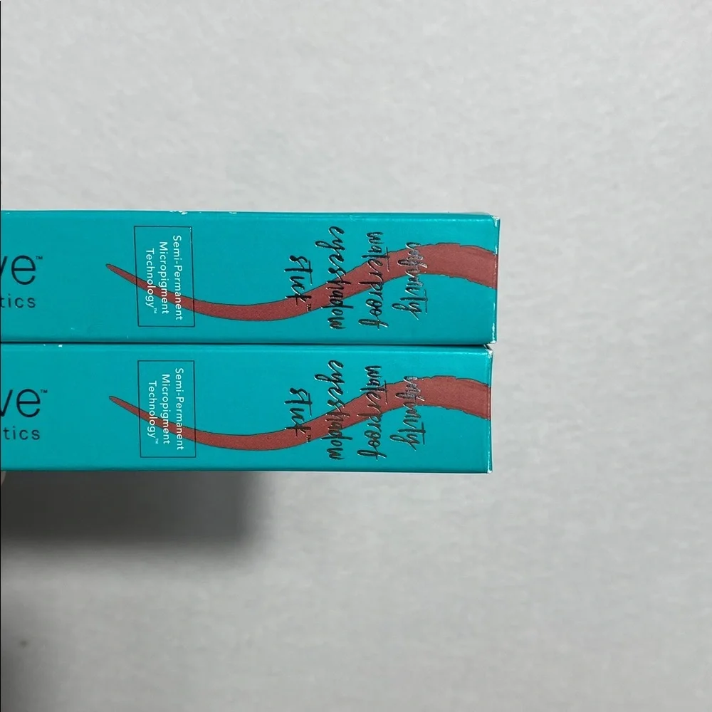 2 Thrive Causemetics Eyeshadow Sticks in Tai warm cranberry matte
